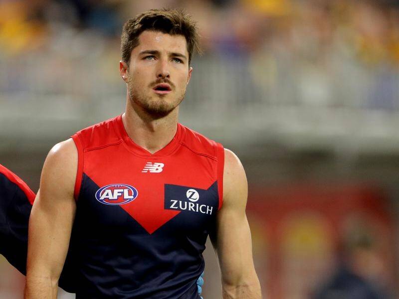 Demon Alex Neal-Bullen has been suspended for four AFL matches after his tackle on Will Hamill.