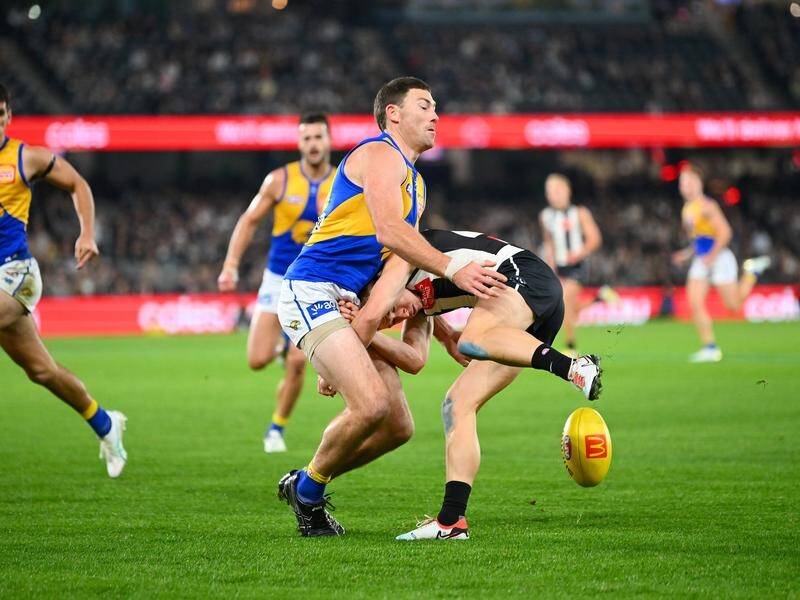 Jeremy McGovern (L) is clear to play against Melbourne despite his torrid work-out against the Pies. (Morgan Hancock/AAP PHOTOS)