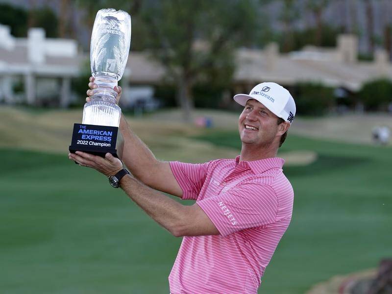 Hudson Swafford lift the winner's trophy at the PGA Tour event in La Quinta, California.