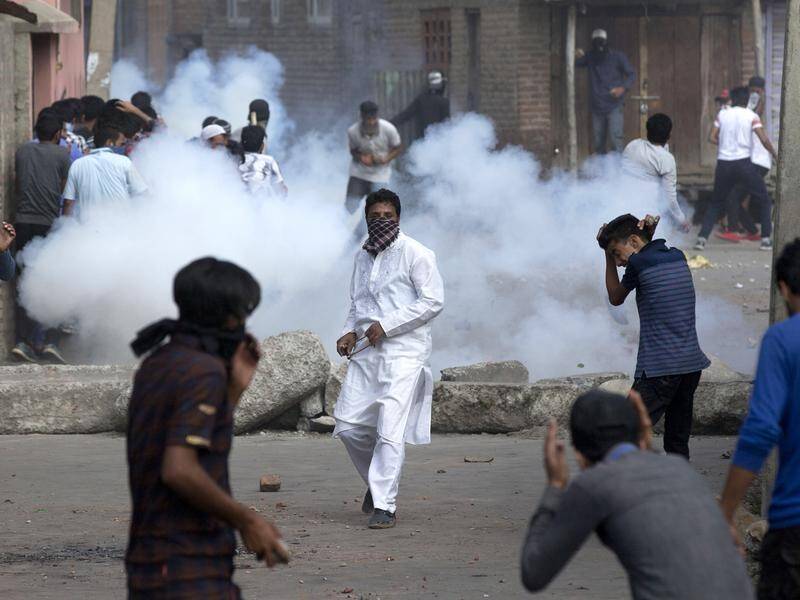 Stone-throwing protesters in Kashmir's main city Srinagar have clashed with paramilitary police.
