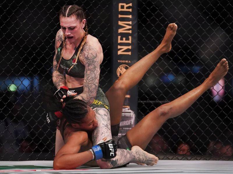 Australia's Megan Anderson (top) will challenge Amanda Nunes for her UFC featherweight belt.