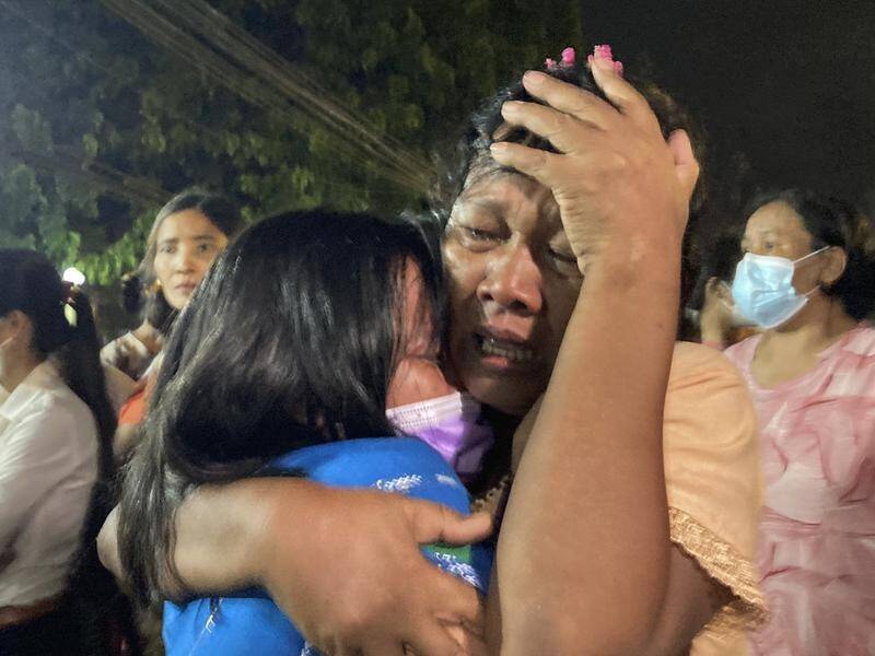 A mother hugs her daughter after her release from Insein Prison in Yangon.