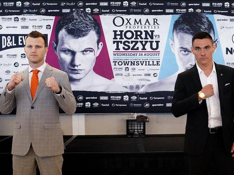 Jeff Horn (l) and Tim Tszyu practise social distancing before coming together on Wednesday.
