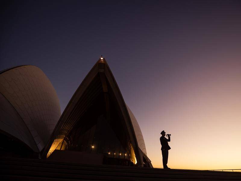 Lone buglers welcomed the dawn on Anzac day across Sydney.