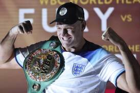 Tyson Fury thinks he'll be too big for Ukrainian Oleksandr Usyk in their world title battle. (AP PHOTO)