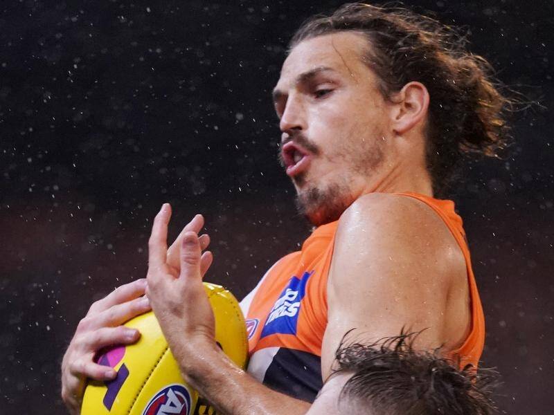 Injury hasn't stopped Phil Davis guiding GWS past Collingwood and into their first AFL grand final.