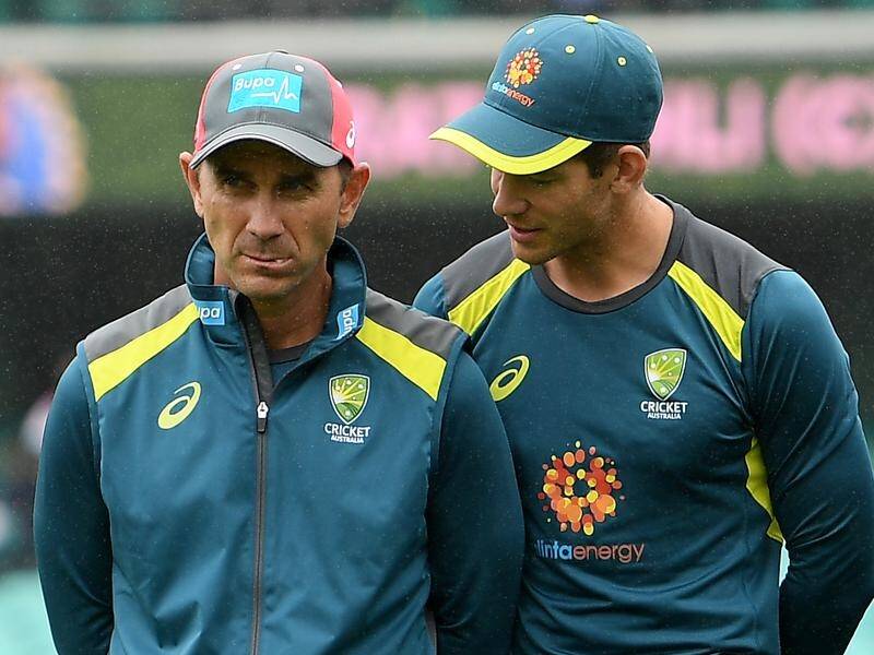 Coach Justin Langer (l) and captain Tim Paine (r) will own the drawn Ashes series result in England.