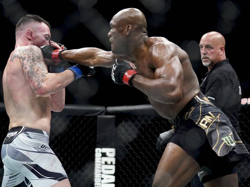 Kamaru Usman (right) has defeated Colby Covington in another successful UFC welterweight defence.