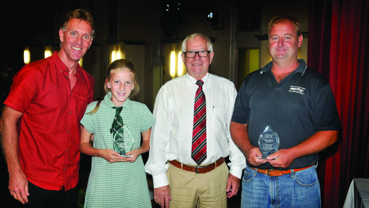 TEAM CELEBRATION:  Former Maitland Sportsperson of the Year winners Tony Howard (left) and Brian Burke (second from right) presented awards to Jannali Hunter from Telarah Public School and Nathan Small from the Maitland Golf Club.