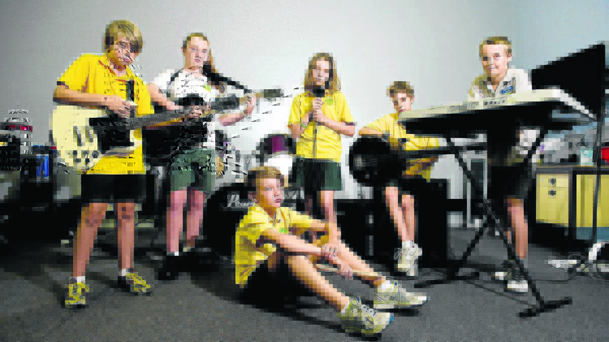 Thornton Public School rock band members Brodie Archer, Mackenzie Whiting, Felicity Walker, Aiden Spencer, Lachlan Scott and Jacob Briers (sitting front). 