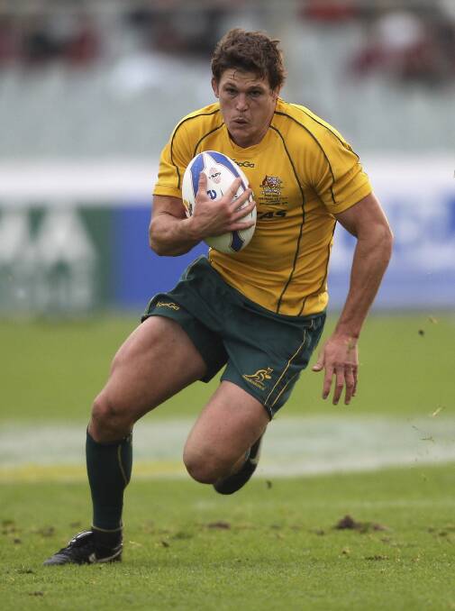 Maitland boy Luke Burgess in the green and gold.
