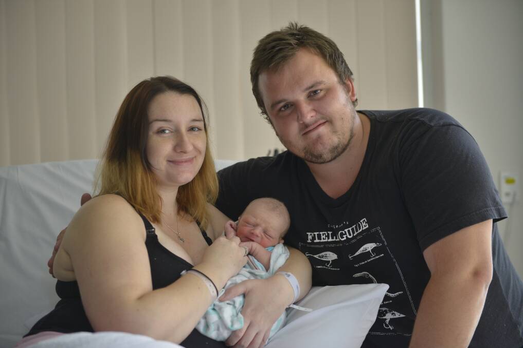 LEAP: Kayla Piwowarski, Calum Taylor and baby Oliver born on February 29. Picture by Perry Duffin