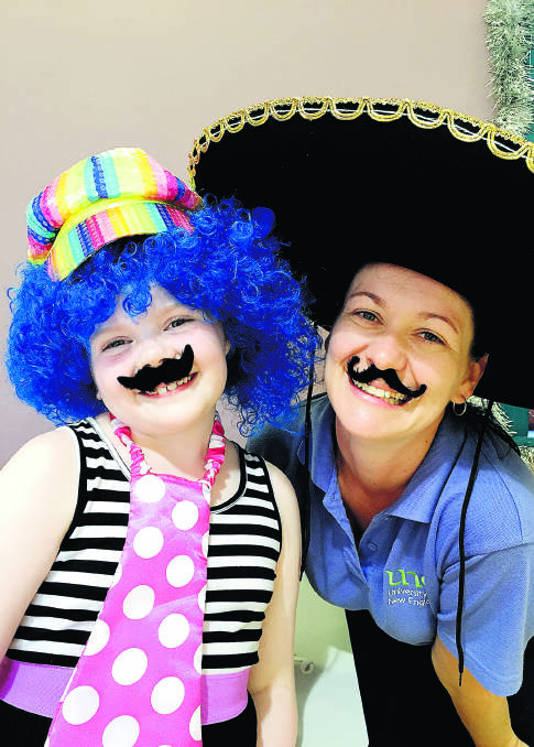 FUN TIMES:  Maitland Junior Citizen of the year Jessica Kowalski, 8, with social worker Bree Bishop who together devised the Boredom Buster program.   	Picture by ALAN HARDIE