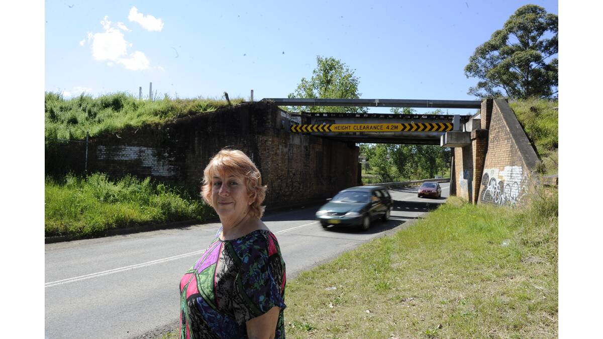 DIRE WARNING:  Farley ­resident Dr  Estella Lowe says it is a matter of time before a tragedy occurs at the site of the Wollombi Road railway underpass unless it is upgraded before work on a new subdivision begins.