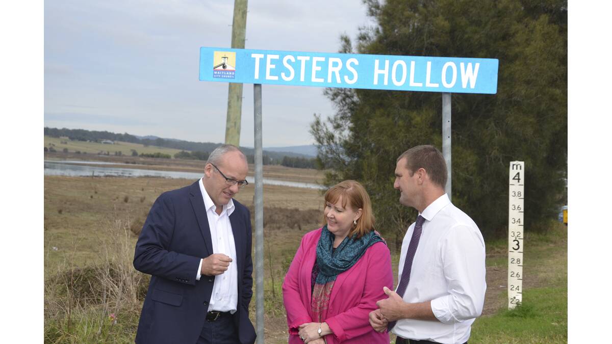 HELP NEEDED:  NSW Opposition Leader Luke Foley with Cessnock MP Clayton Barr and Maitland MP Jenny Aitchison at the scene of the crisis last year.   	