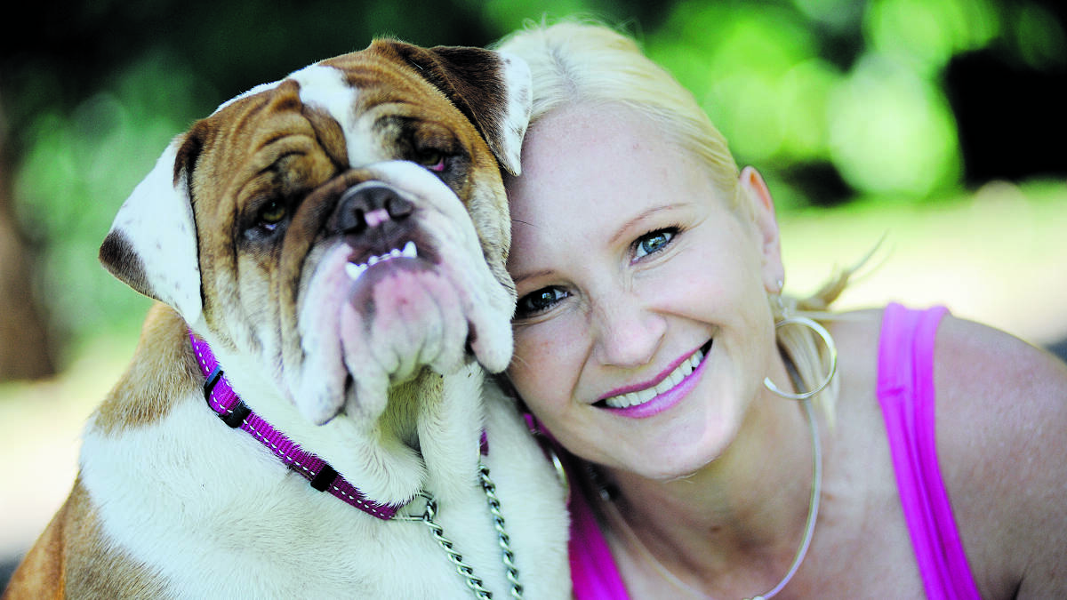 BEST PALS:   Jenny Parker with her bulldog Malibu who she says is so laid-back.  	Picture by CATH BOWEN 