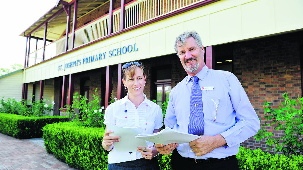 TIME TO ACT: Parent Sally Davies and St Joseph’s principal Anthony Weir are key supporters in the introduction of the KidsMatter program at the school.           	Picture by CATH BOWEN
