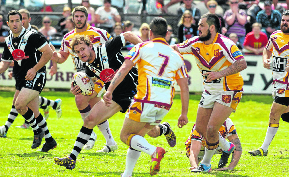 MAJOR PREMIERSHIP: Billy Greentree runs the ball for the Raymond Terrace Magpies in their 18-12 grand final win over Waratah Mayfield in the Hunter Rugby League C-grade decider. Picture by STUART SCOTT