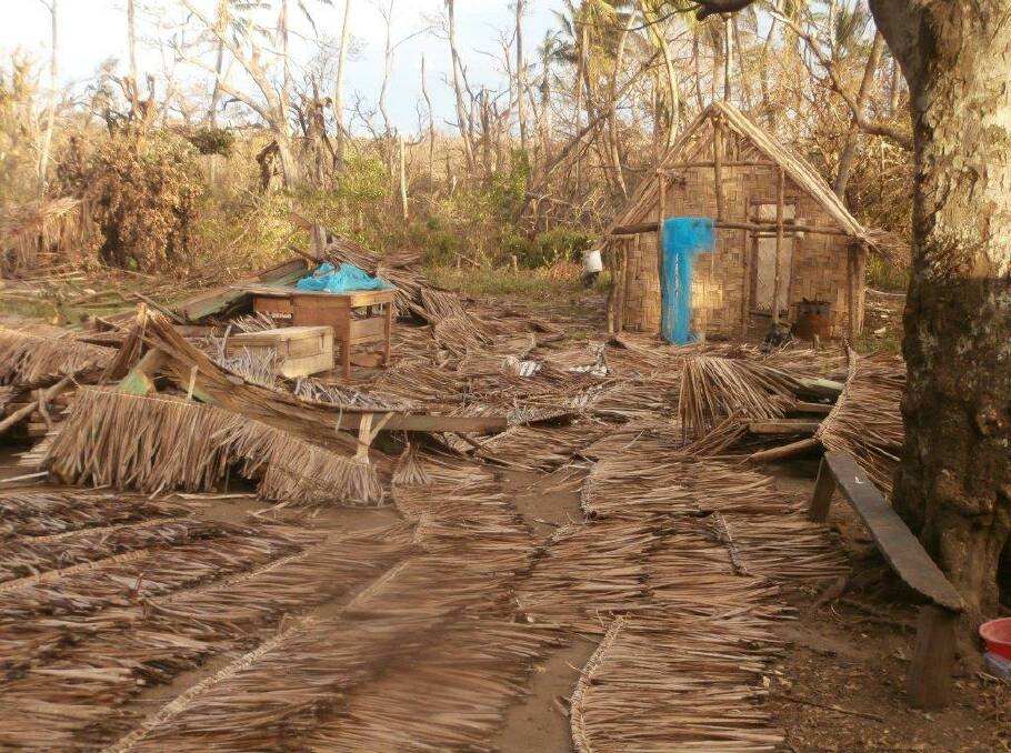 DESTROYED: The remains of Charlie's village after it was ravaged by Cyclone Pam.