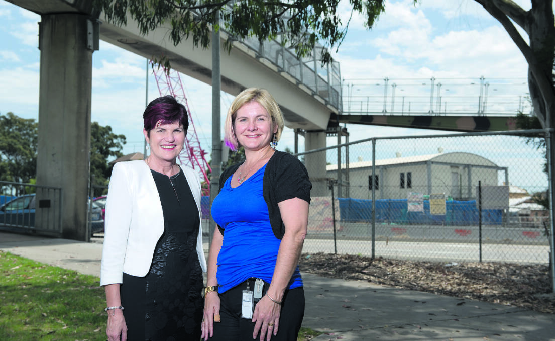 DELIVERING INFRASTRUCTURE: maitland MP Robyn parker with Hunter RMS regional manager Anna Zycki at the site of the new footbridge.  