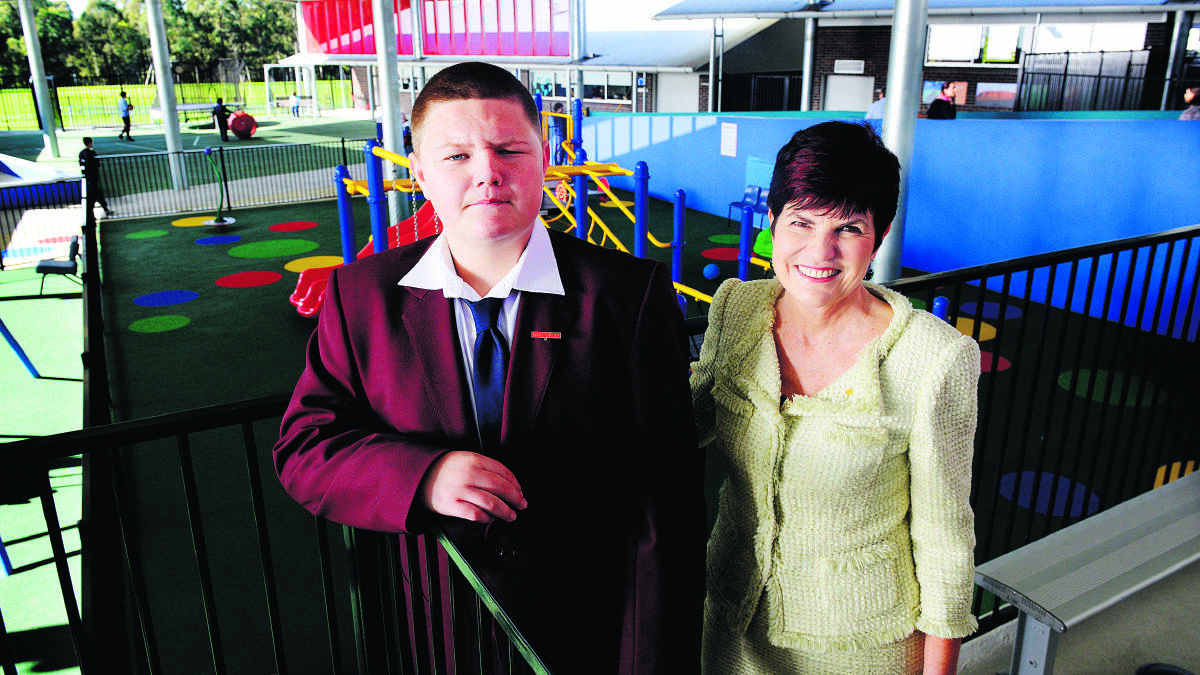 FIRST DAY:  School leader Luke Barrett with Member for Maitland Robyn Parker at Thursday’s official opening.    	Picture by  STUART SCOTT  120614SS103