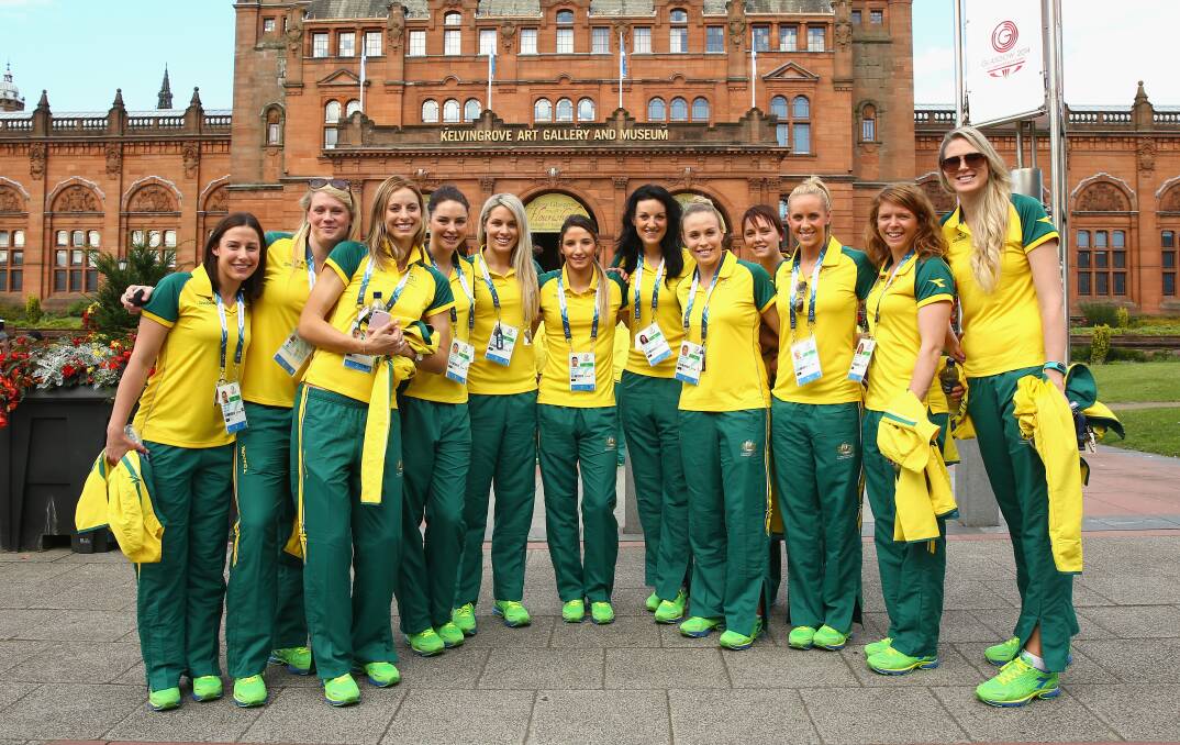 HIGH HOPES: Bendigo's Caitlin Thwaites, second from left, and Kerang's Julie Coreltto, third from left, with their Australian netball team-mates in Glasgow. Picture: GETTY