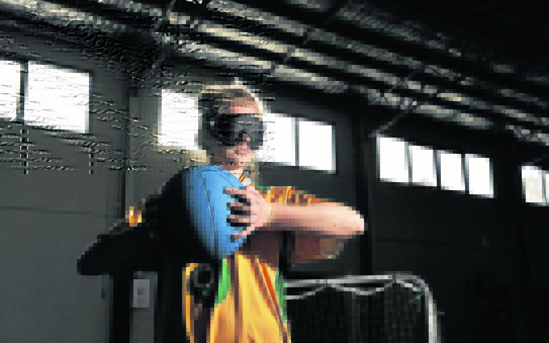 OUT OF SIGHT:  Brodie Smith takes part in a game of Goalball. 	Picture by PERRY DUFFIN