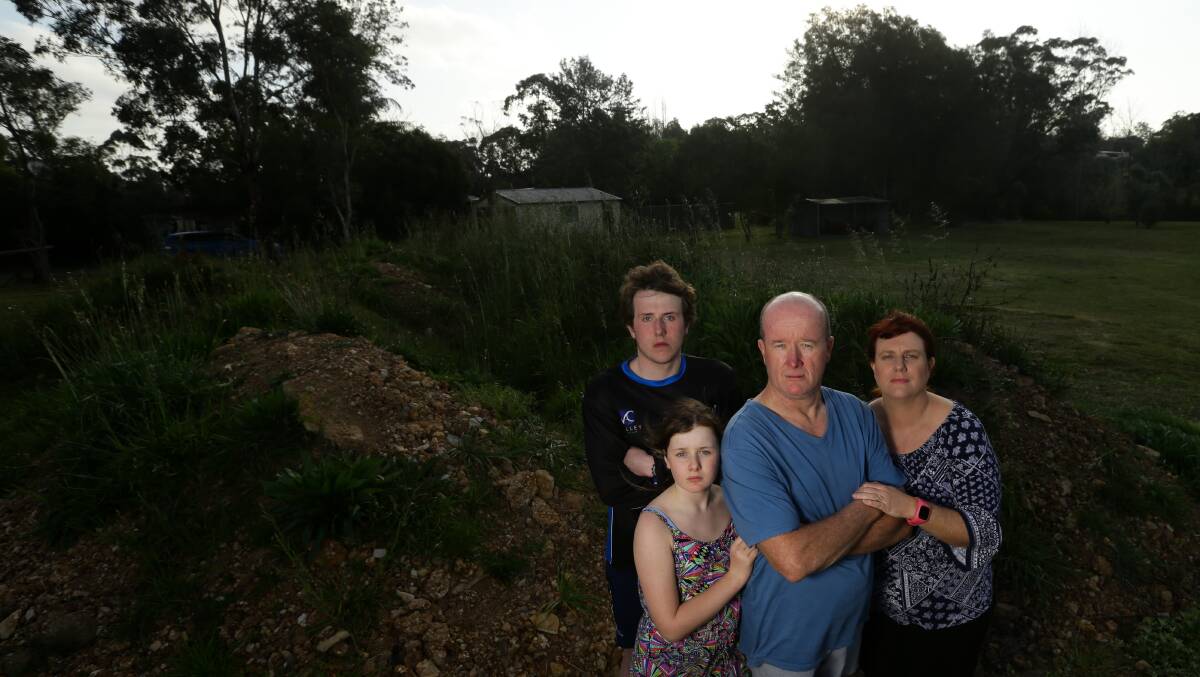 'Like pulling teeth': Bernie Heald of Lochinvar with her husband Bruce and their children Logan, 17, and Aleena, 11. Ms Heald gave evidence to the Financial Services Royal Commission in Melbourne on Thursday. Picture: Jonathan Carroll