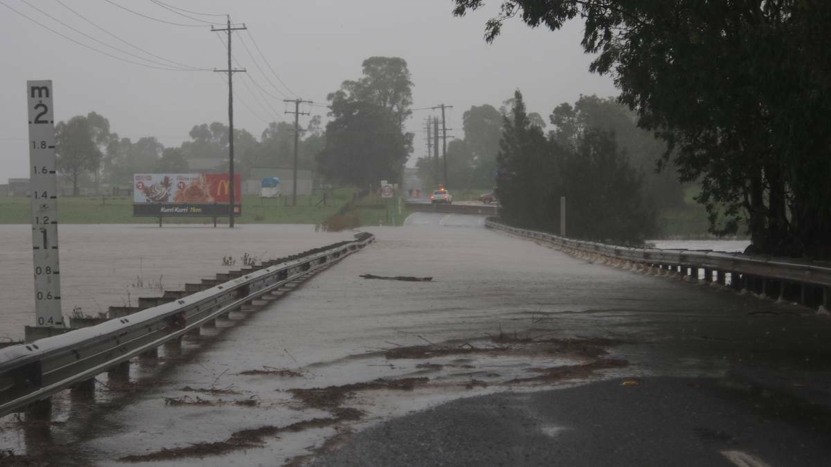 Cessnock Road at Testers Hollow under water in early 2016. It was the second time in nine months the road had been cut by water for several days.