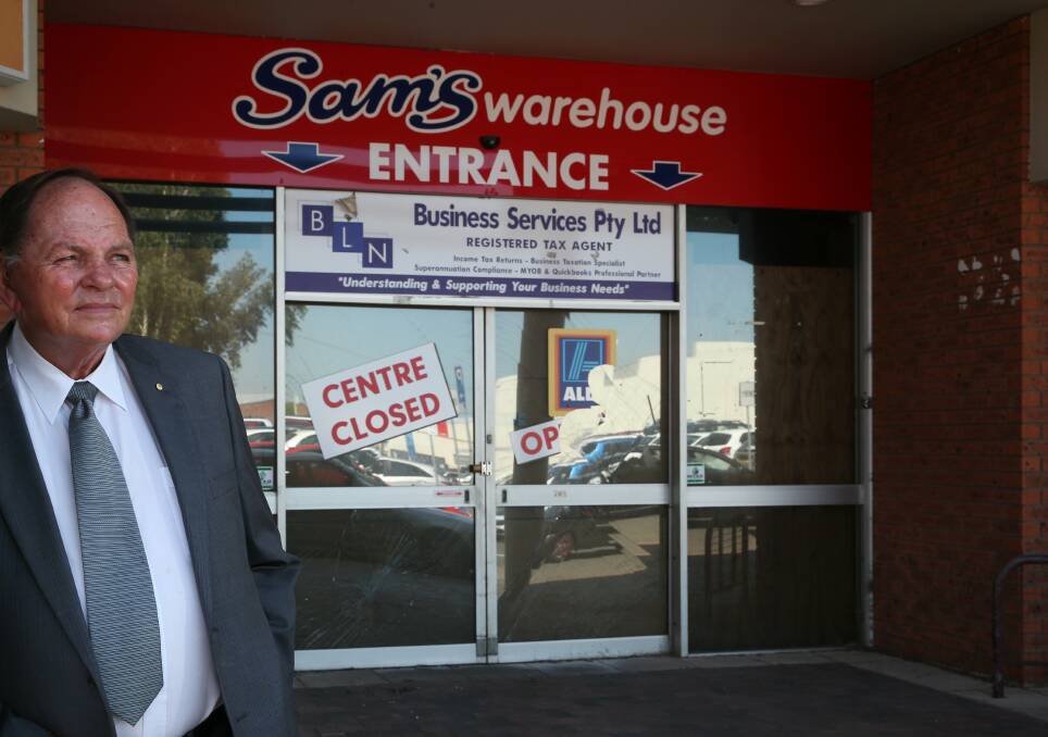 Questions: Maitland Mayor Peter Blackmore outside the old Sam's Warehouse site in Elgin Street. Picture: Simone De Peak