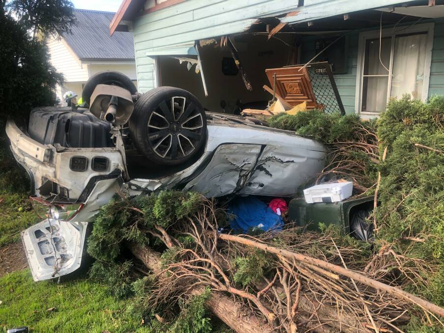 Car crashes into Telarah home. Pictures: NSW Ambulance