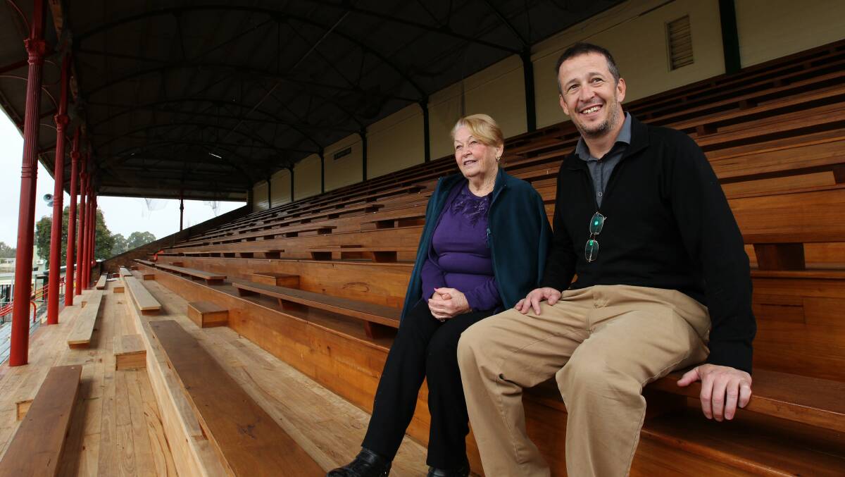 Spruced up: HRAHA senior vice president Margaret Enright and vice president Paul King in the grandstand. Picture: MAX MASON-HUBERS