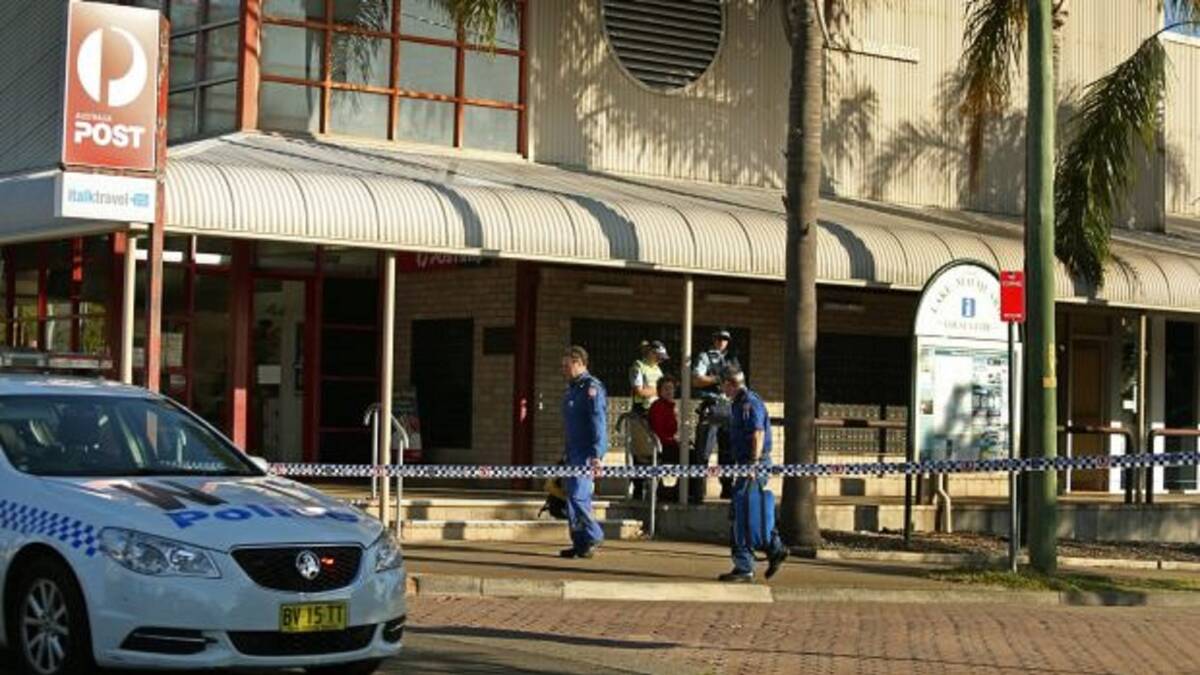 SCENE: Police investigating the shooting of Warners Bay Australia Post worker Stephen Hodge on September 9, 2015. Picture: Marina Neil 