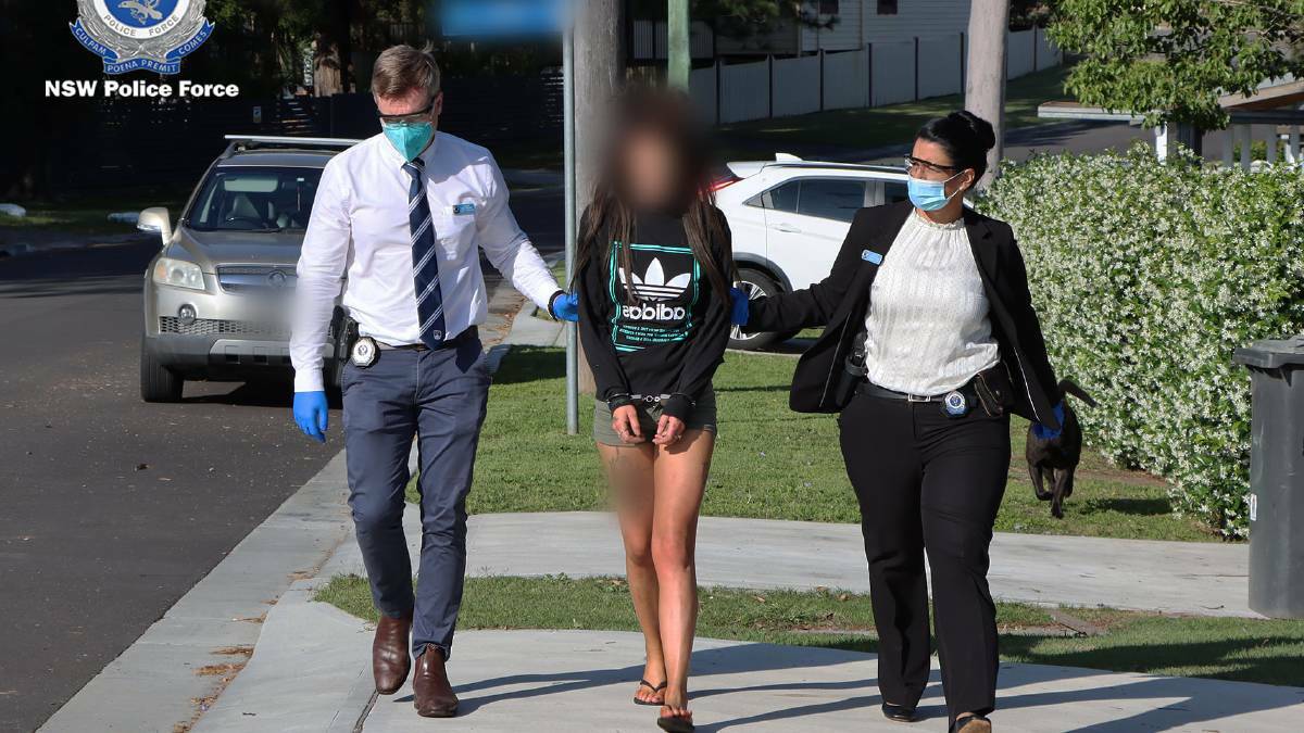 ASSISTED: Taylah McDonald is arrested at West Wallsend last year. Picture: NSW Police 