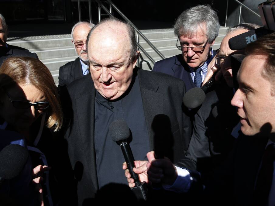 CLEARED: Former Adelaide Archbishop Philip Wilson leaves Newcastle Local Court after being sentenced to home detention in August. Wilson would ultimately successfully appeal against his conviction. Picture: Darren Pateman 