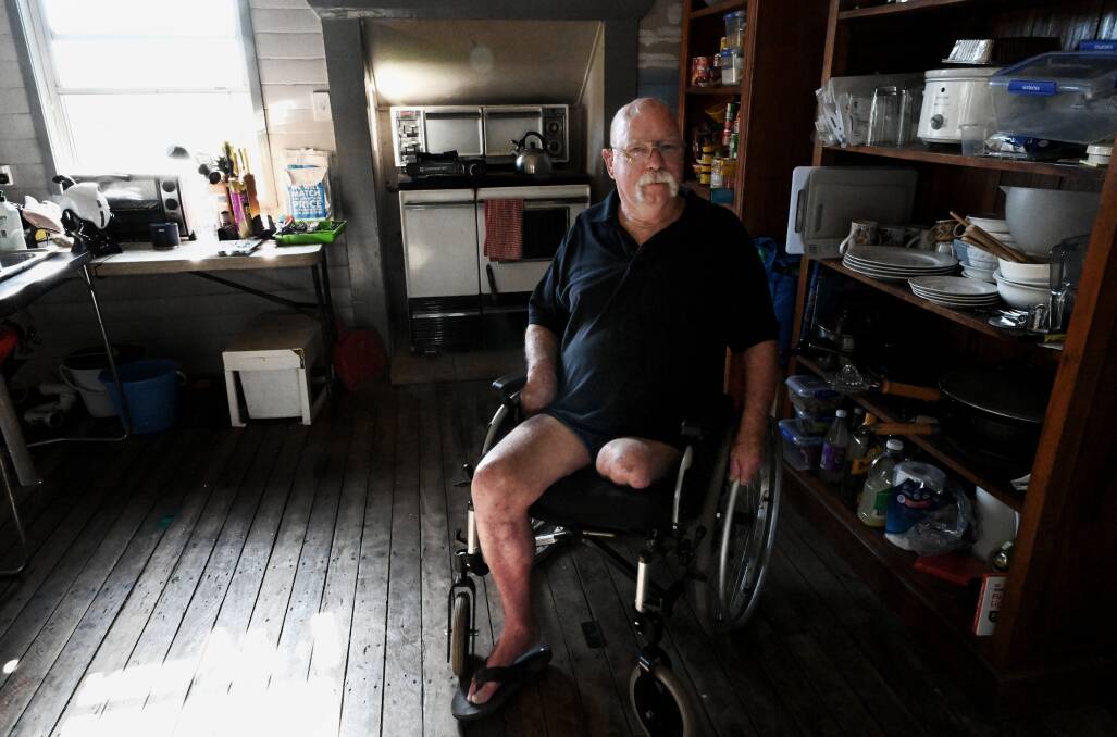 This picture of Lismore, NSW resident Brian Burgin who nearly lost his life in the 2022 won an ACME award in the non-daily Photo of the Year category. Picture by Cathy Adams