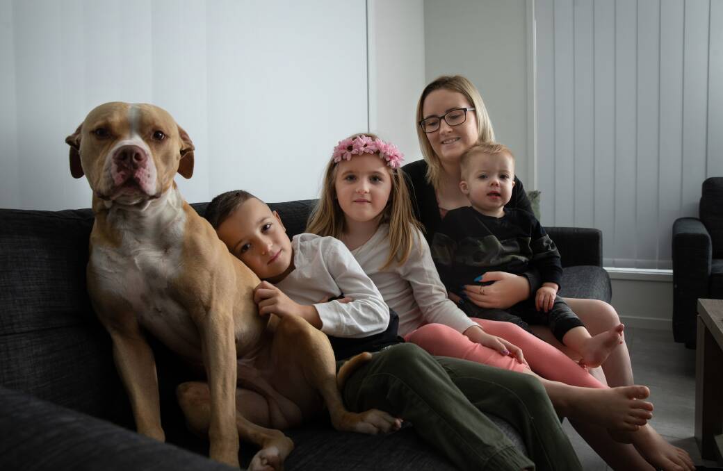 We are family: Shannon Trapman, with children Chase 7, Allirah 5 and Cruz 1, plus family dog Kaos, said she "wanted to prove everyone wrong". Picture: Marina Neil 