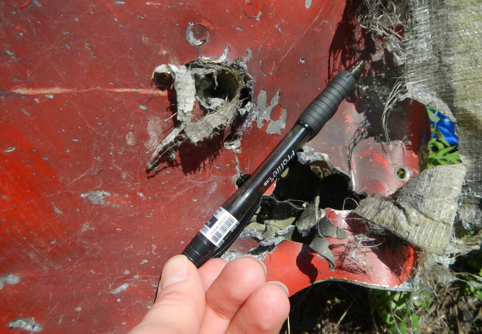 This pen shows the scale of penetrative fragment damage to the plane fuselage by the missile #3