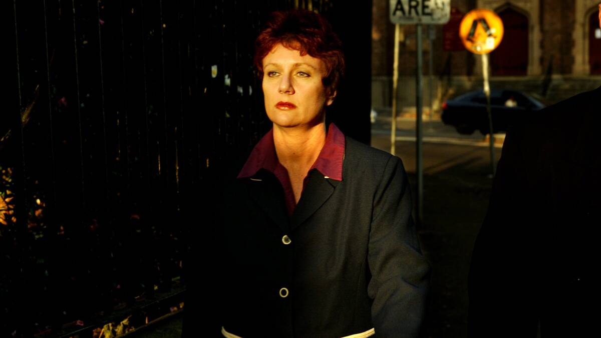 Kathleen Folbigg leaves Sydney's Supreme Court in 2003.