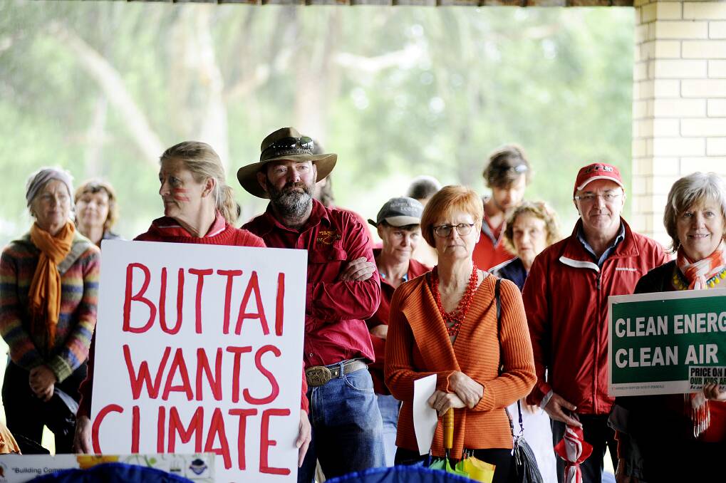CLIMATE ACTION: About 80 people attended a rally at Maitland Park yesterday as part of the National Day of Climate Action.