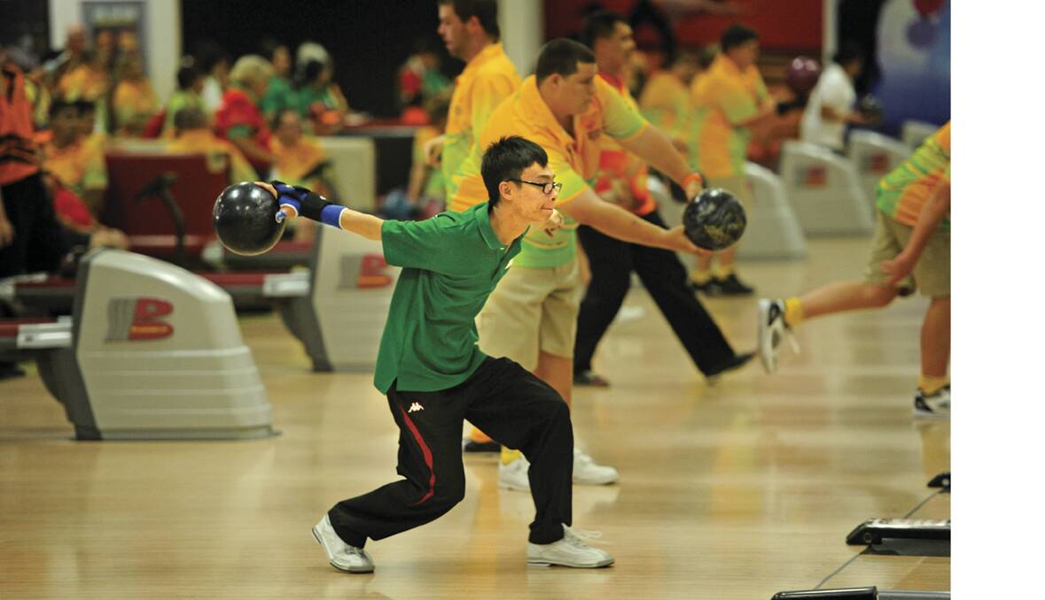 SPECIAL OLYMPICS: Yong Yang Wong launches into a shot.