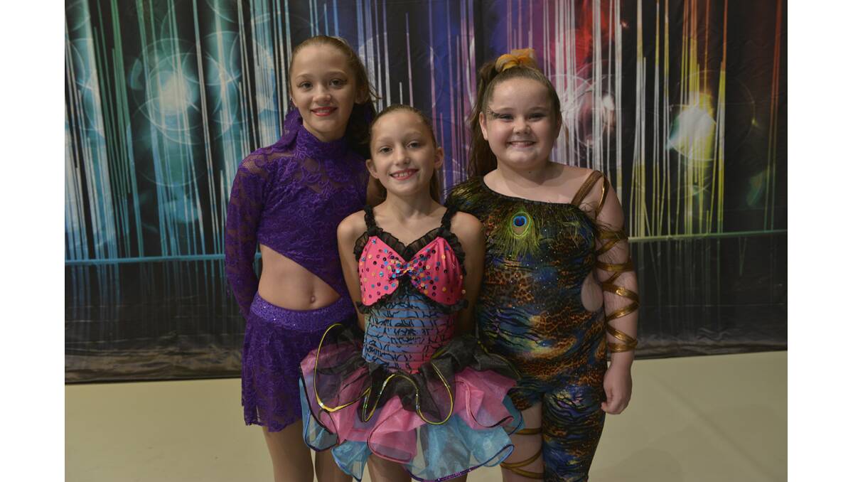 STEPPING OUT: Corryn and Laura Mason of Chisholm with Lukah Everleigh from East Maitland.