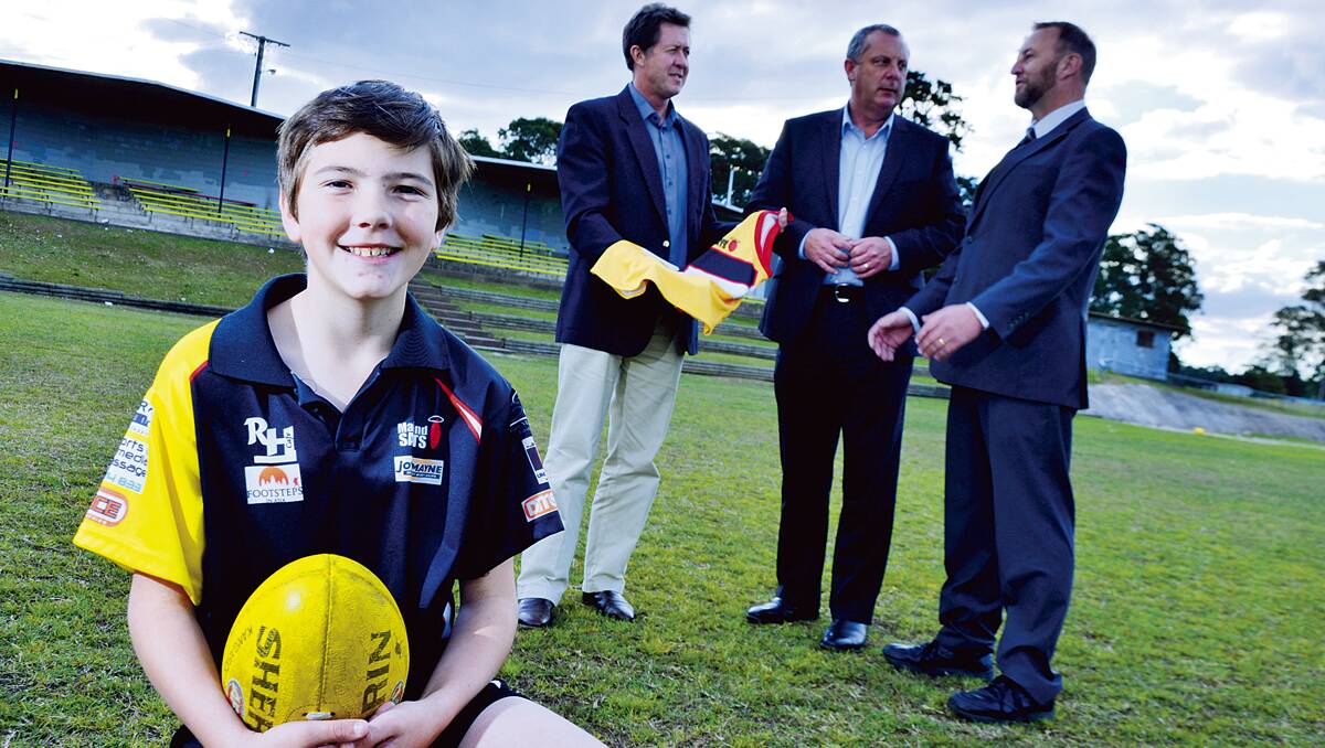 EXPANSION PLANS: Maitland Saints under-13 player Nathan Merrick, opposition youth and sport spokesman Luke Hartsuyker, The Nationals’ Hunter candidate Michael Johnsen and Maitland Saints president Kevin Greaves at the Saints’ home ground, Max McMahon Oval, on Thursday.