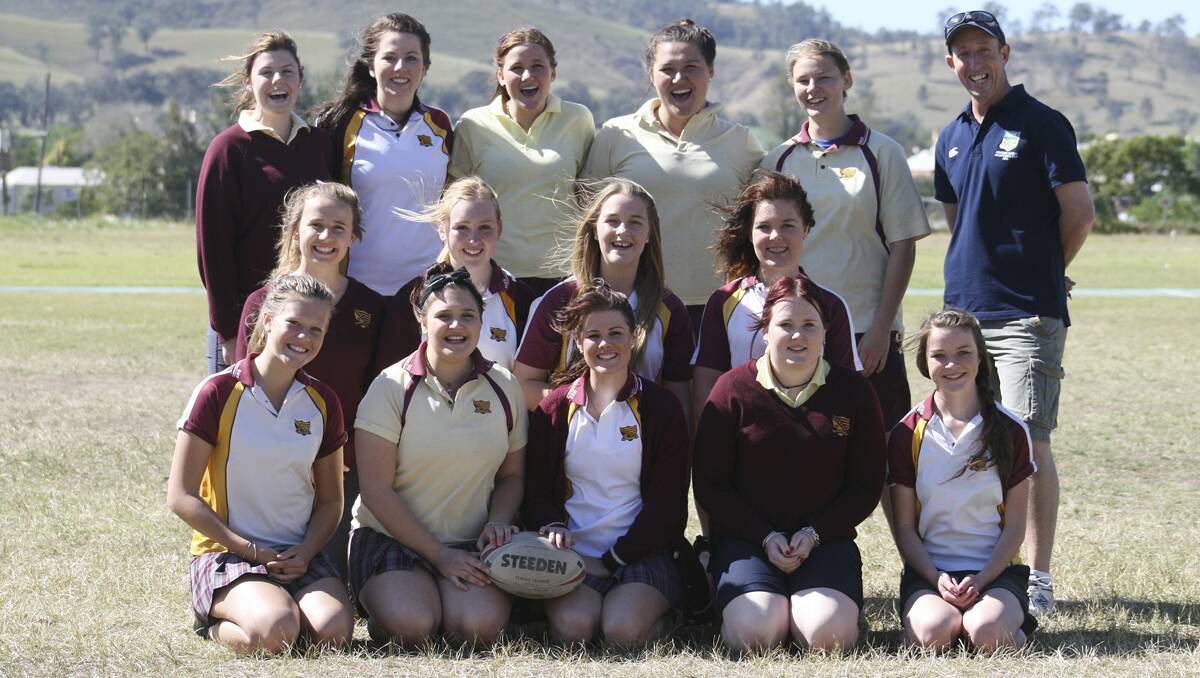 EXHIBITION: Dungog High School girls’ team  (front) Alexis Neilson, Jaime Russell, Chelsea Greentree, Makayla Taylor, Grace Maher, (middle) Ebony Graham, Shelby-Lee Wintle, Laura Cotterill, Allira Taylor, (back} Chloe Tanner, Tyra Hayden, Alyssa Pustolla, Learney Blandford, Rachael Somerville, Tim Francey (coach). Absent: Maddison Brown.