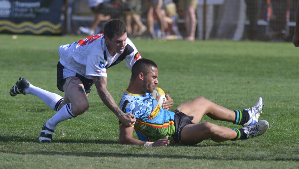 Action from the annual NSW Aboriginal Rugby League Knockout is now down to the final four. PICTURE Stuart Scott.