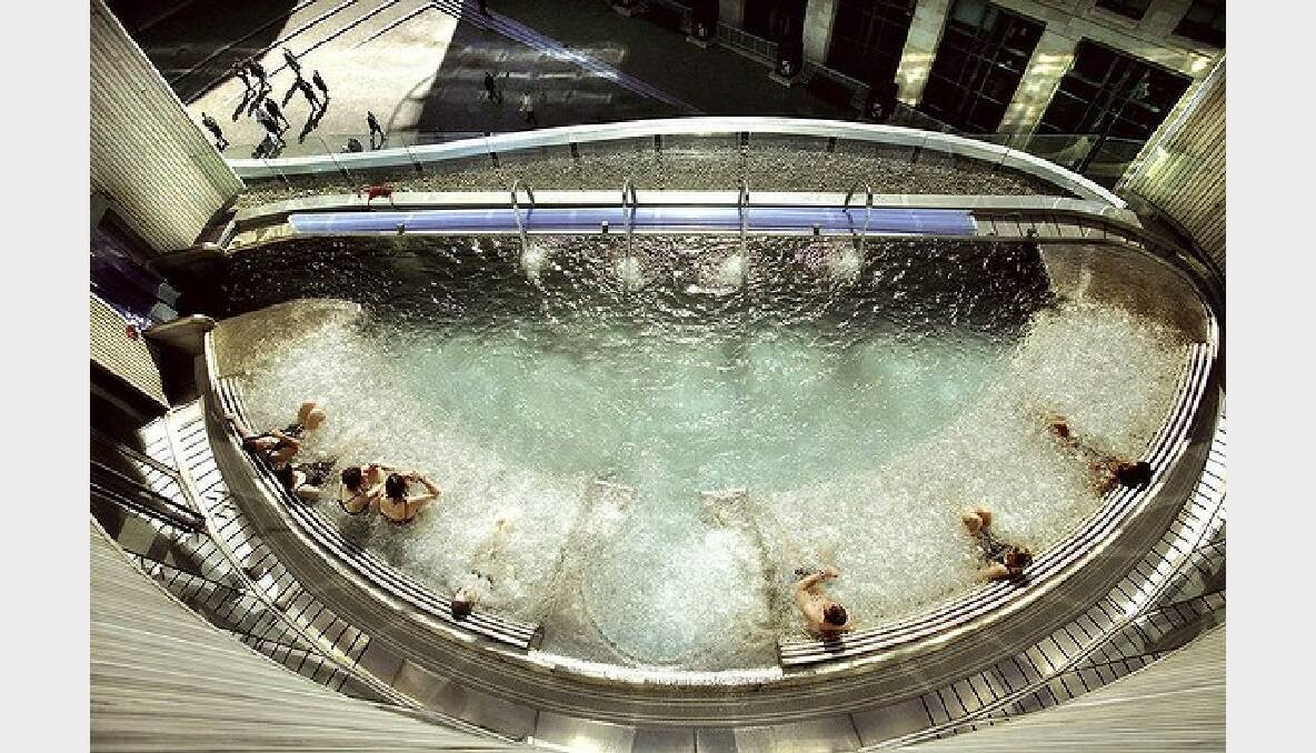 The 35 degree, mineral-rich hydropool at the Sheraton Grand Hotel, Edinburgh, United Kingdom is part of a six-storey spa.