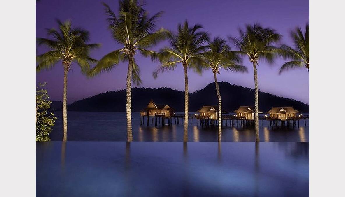 The infinity pool overlooks granite boulders at the Pangkor Laut Resort on the private island in Malaysia. Photo: Veronique Mandray