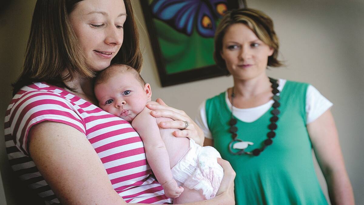 SPECIAL RELATIONSHIP: First-time mother Melissa Vassallo and Olivia Jane with doula Gwen Teasdale.Picture by CATH BOWEN