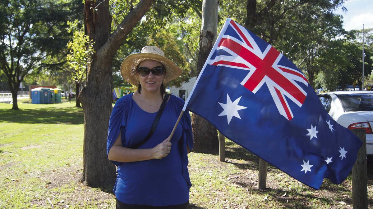 Tania Ford of Telarah flies the flag on Australia Day.