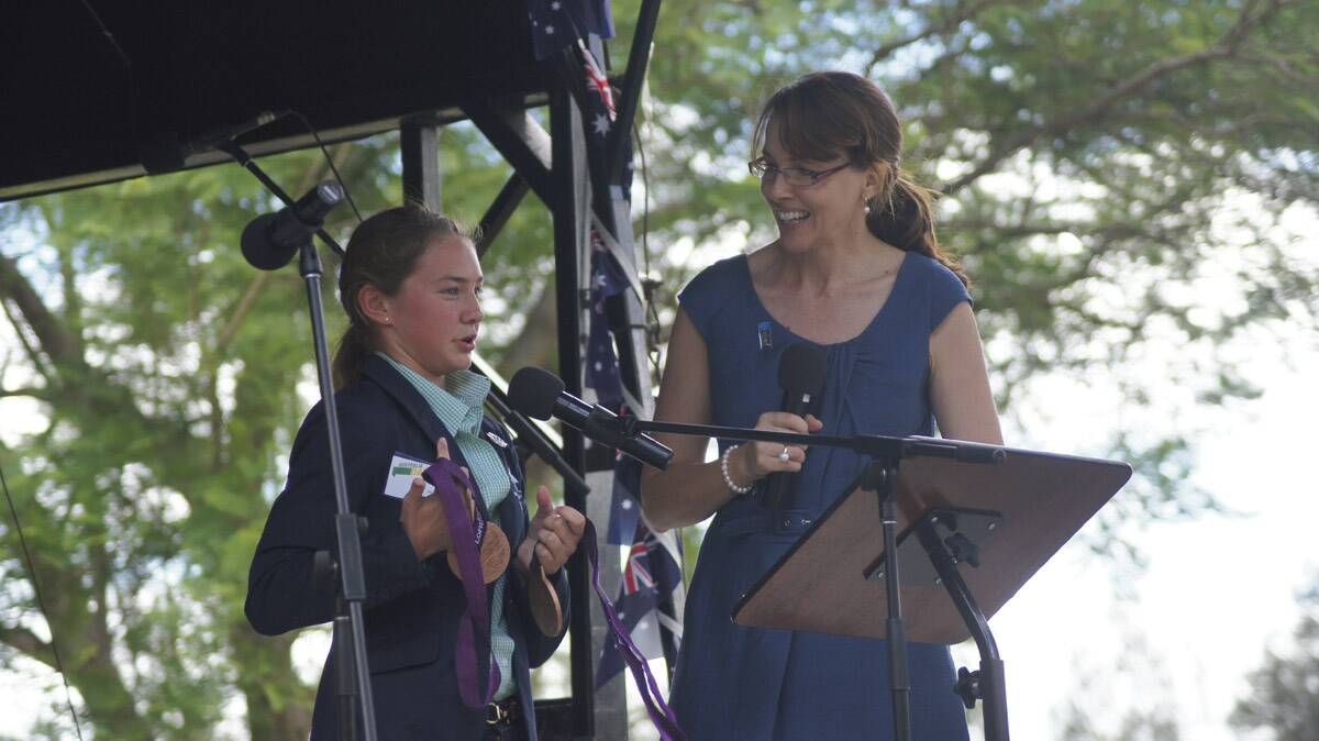 Australia Day Ambassador for Maitland Maddi Elliot tells of her experience competing for Australia at the Paralympic Games. Former Australia Day Ambassador Melinda Smith interviews her on stage.